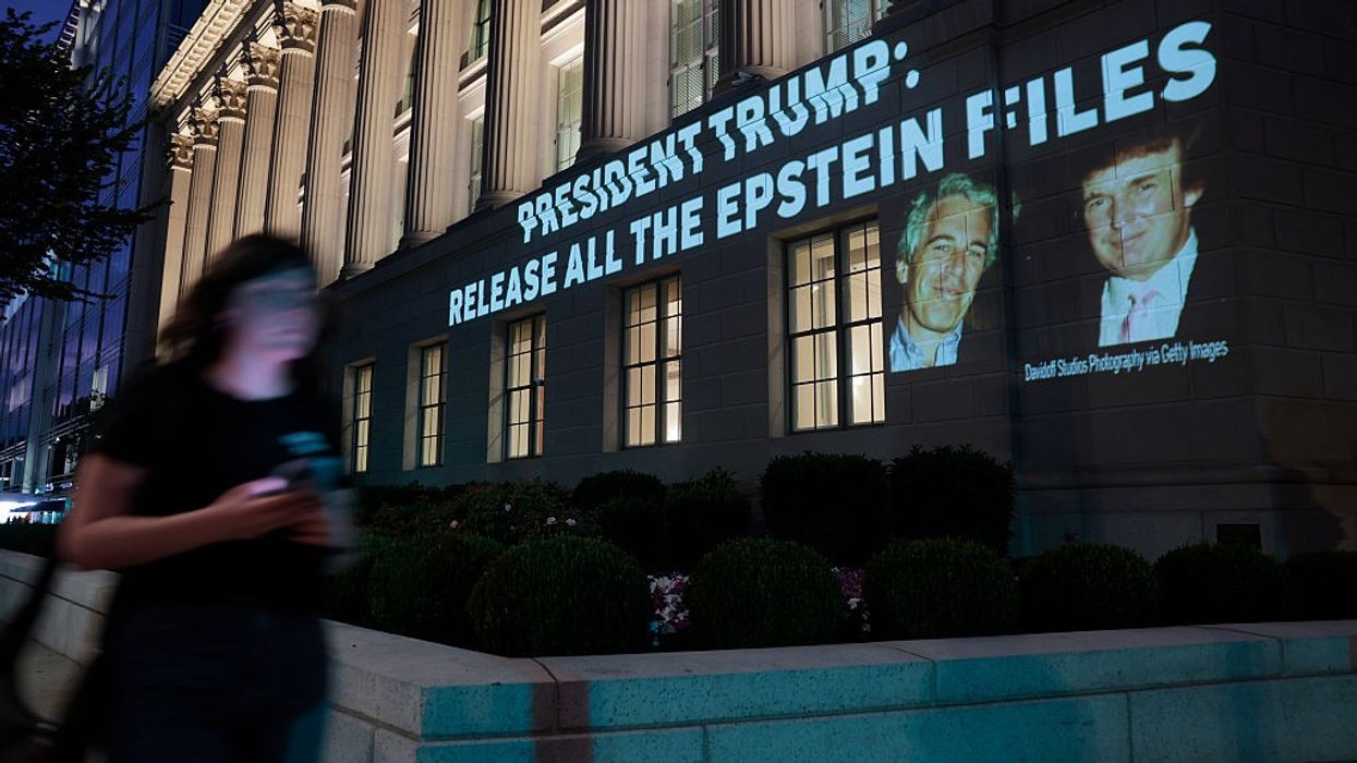 Activists Project Message To Trump Calling For Release Of Epstein Files