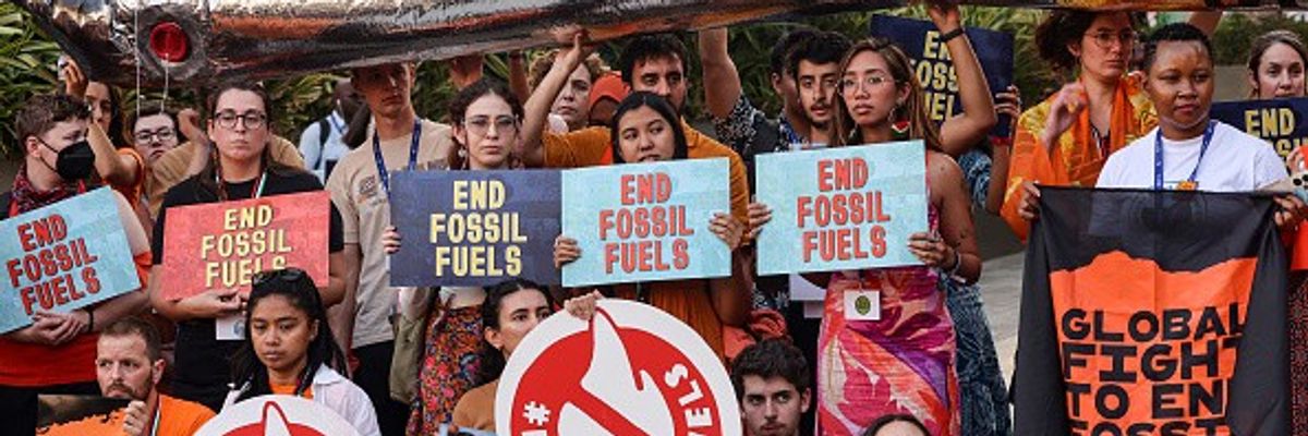 Activists protest against fossil fuels at COP28