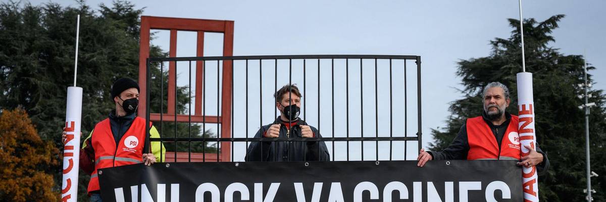 Activists protest in favor of an agreement to waive patent protections for Covid-19 vaccines on November 30, 2021 in Geneva.