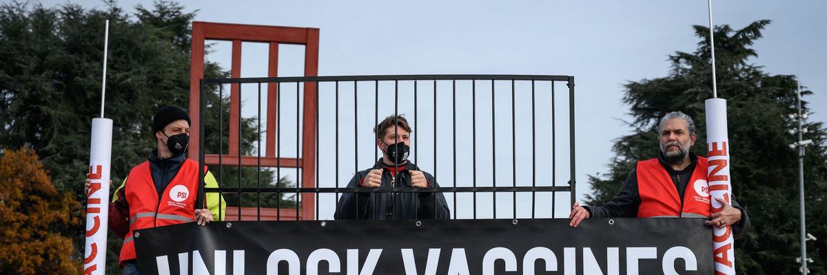 Activists protest in favor of an agreement to waive patent protections for Covid-19 vaccines on November 30, 2021 in Geneva.