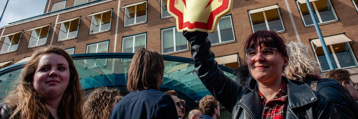 Activists protest in front of the Shell building in The Hague on April 5th, 2019.