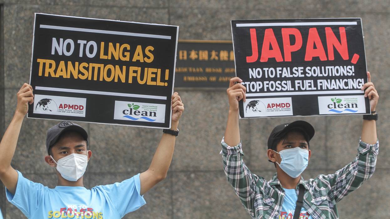Activists protest outside the Japan Embassy in Jakarta, Indonesia on August 3, 2022.
