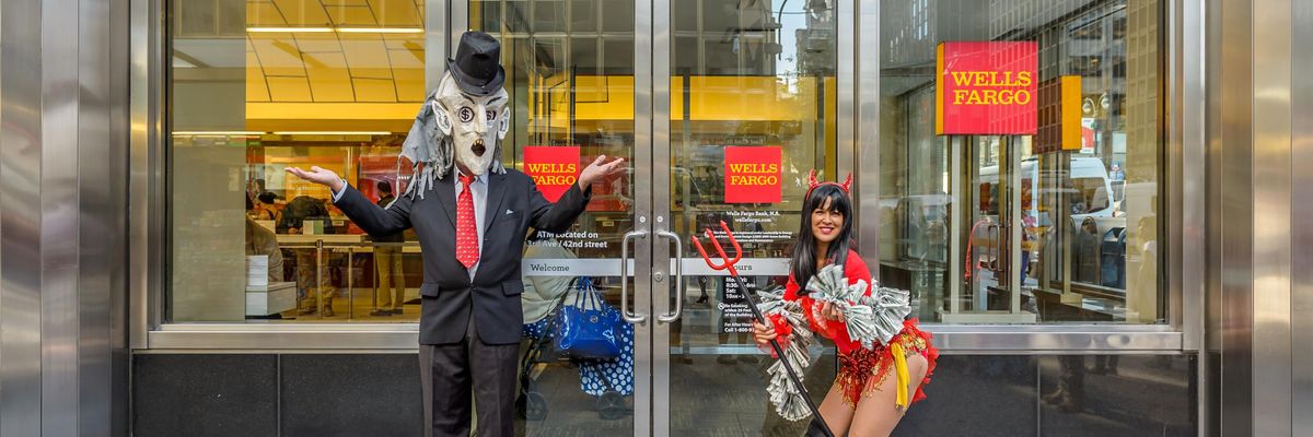 Activists protest outside Wells Fargo's corporate headquarters in New York City on October 5, 2016.