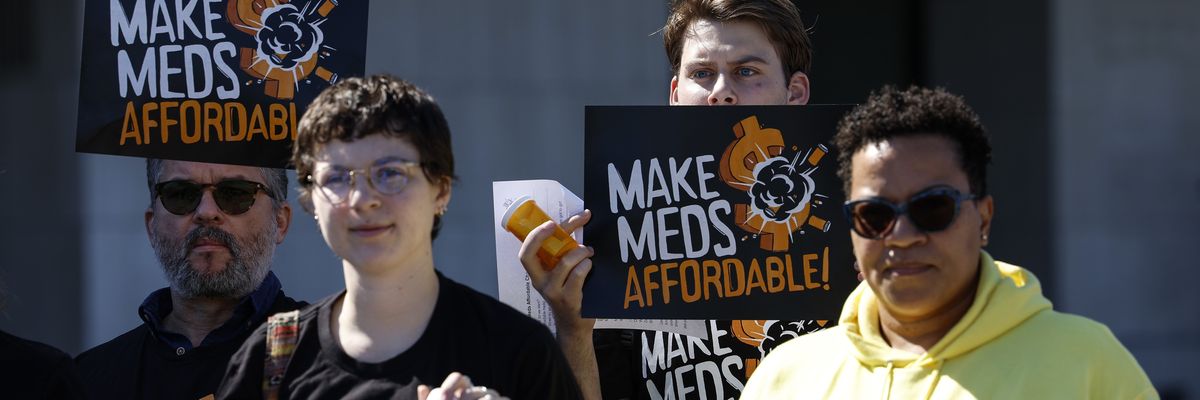 Activists protest prescription drug costs in front of the U.S. Department of Health and Human Services