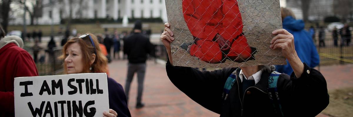Activists protest the continued operation of the Guantánamo Bay detention camp in front of the White House on January 11, 2018.