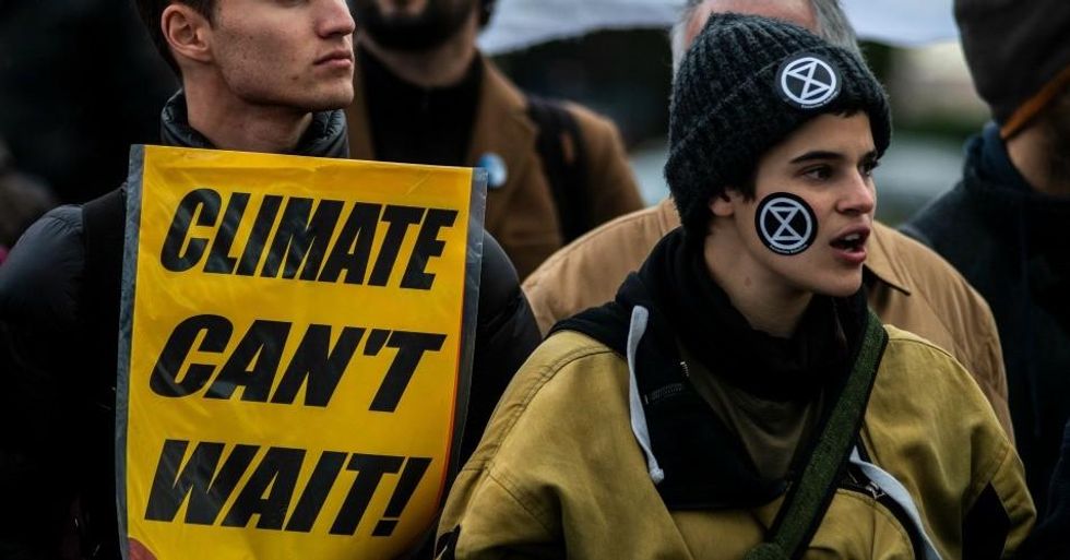 Activists protesting outside IFEMA, where UN Climate Change Conference COP25 is being held. Fridays for Future and Extinction Rebellion activists are demanding solutions against climate change. (Photo: Marcos del Mazo/LightRocket via Getty Images)