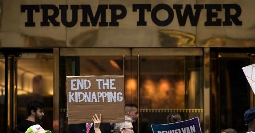 Activists rally and call on the Trump administration to meet tomorrow's court ordered deadline to return immigrant children to their families after being separated at the southern border, outside Trump Tower in Midtown Manhattan, July 25, 2018. (Photo: Drew Angerer/Getty Images)