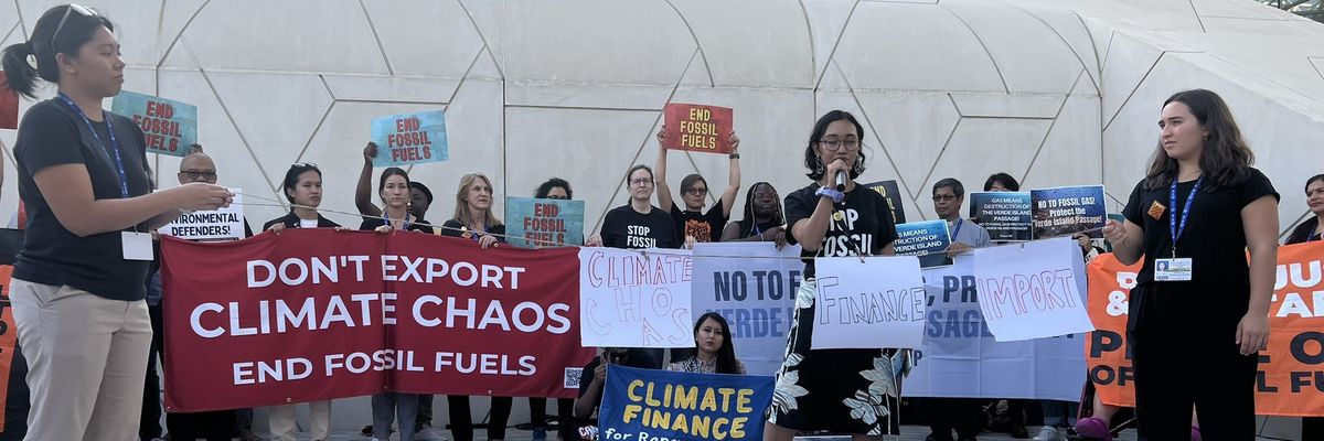 Activists speak out against LNG and fossil fuels at COP28.