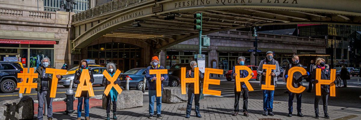 Activists spell out #TaxTheRich at Grand Central Station in New York City on March 4, 2021. (Photo: Erik McGregor/LightRocket via Getty Images)