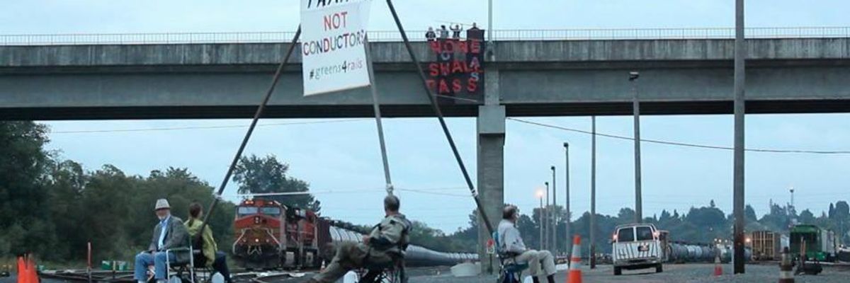 Climate Activists Stage Resistance at Rail Yard to Protest 'Fossil Fuel Takeover'