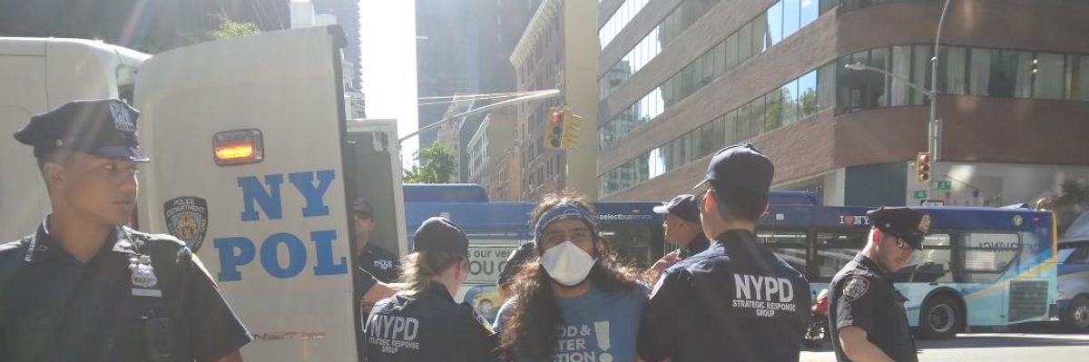 Activists were arrested in New York City on August 18, 2022 after demonstrating outside Senate Majority Leader Chuck Schumer's (D-N.Y.) Manhattan office, where they expressed opposition to the fossil fuel-friendly permitting reforms he agreed to bring to the floor to secure Sen. Joe Manchin's (D-W.Va.) support for the Inflation Reduction Act.