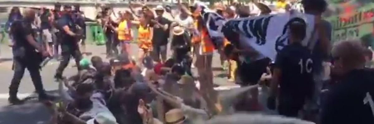 On 'Hottest Day in History of France,' World Told 'Do Not Look Away' as Police Tear-Gas Climate Campaigners in Paris