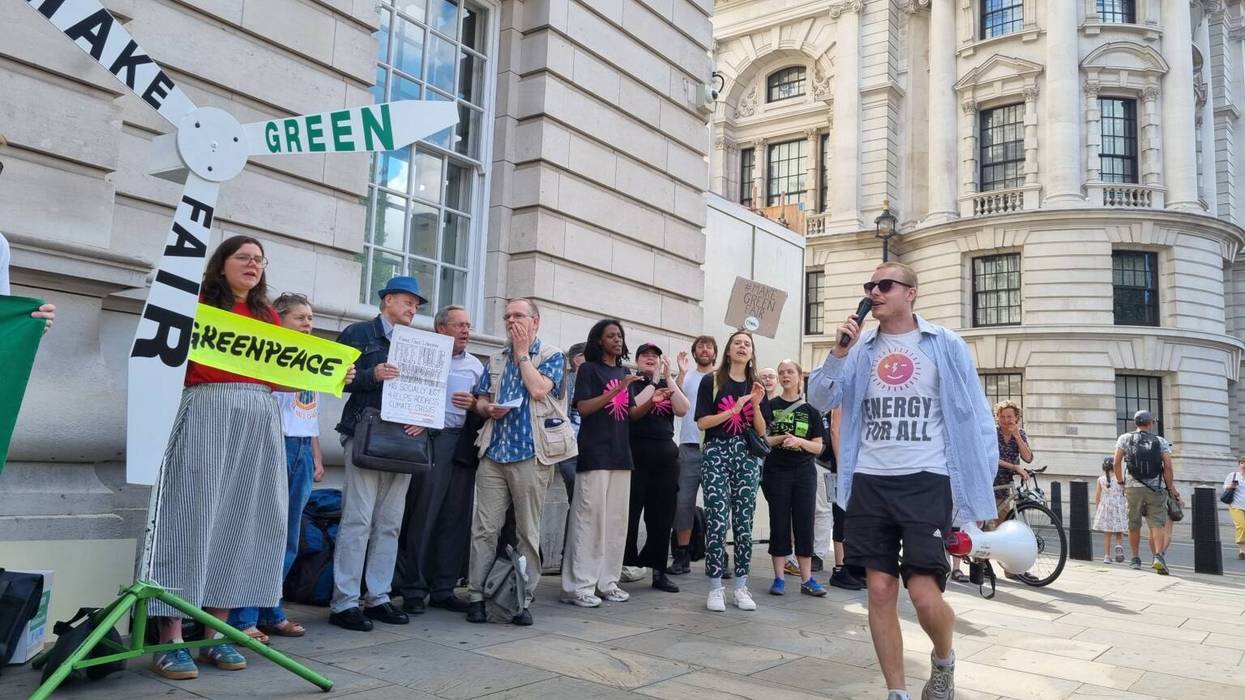 Activists with groups including 350.org and Fuel Poverty Action protested