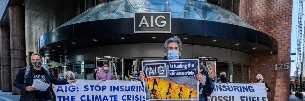 Activists with the Insure Our Future network gathered outside AIG Headquarters in Manhattan during their annual shareholders' meeting on May 12, 2021 to demand that AIG take action on climate change.