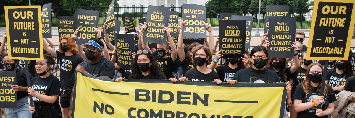 Activists with the Sunrise Movement protest in front of the White House