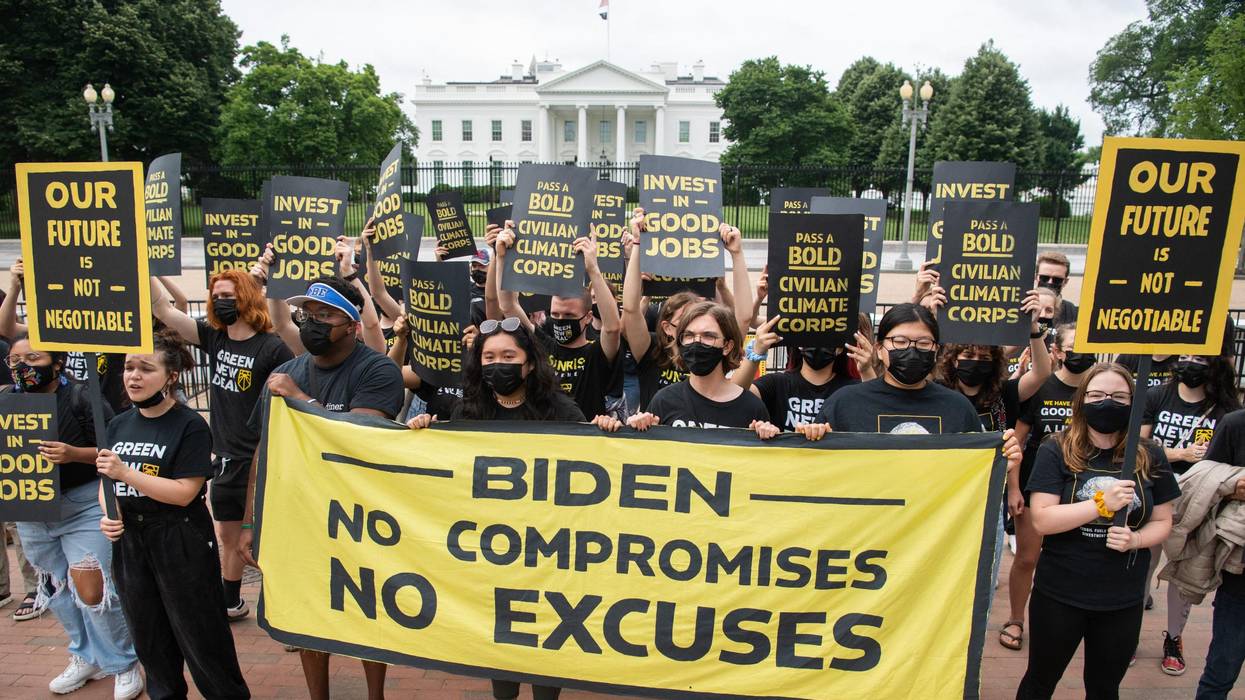 Activists with the Sunrise Movement protest in front of the White House