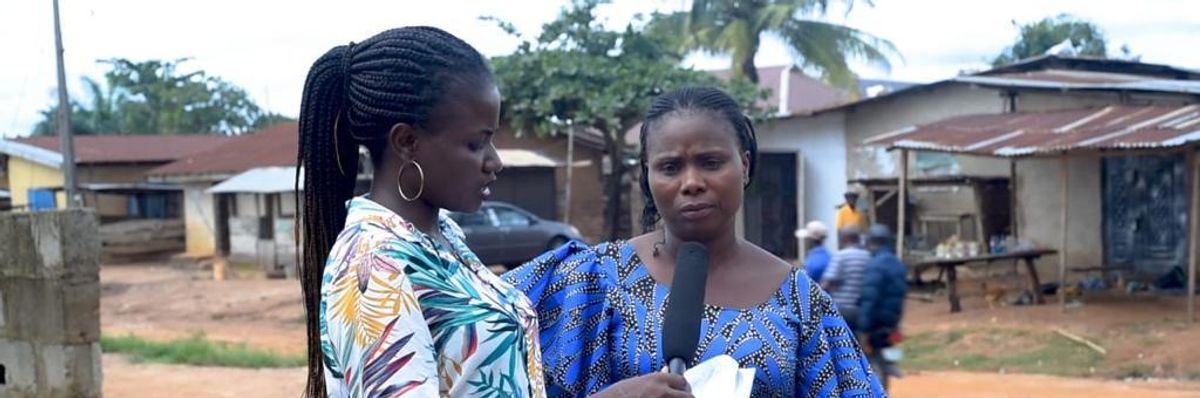 Adeyemi Adeitan interviews a woman from a rural area in Ondo state, southwestern Nigeria, about her experience with access to Covid-19 medical tools on June 24, 2022.