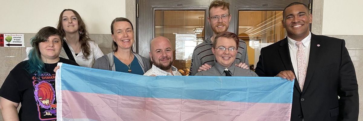 Advocates celebrate after the Kansas City Council approved a resolution declaring the city a sanctuary for LGBTQ+ people