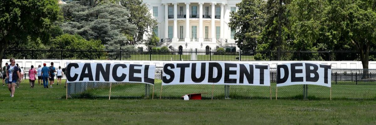 Advocates protest outside the White House, demanding student debt cancellation.