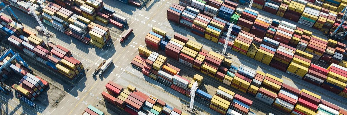 Aerial view of shipping containers sitting stacked at Zhoushan Port on November 11, 2021 in Zhoushan, China