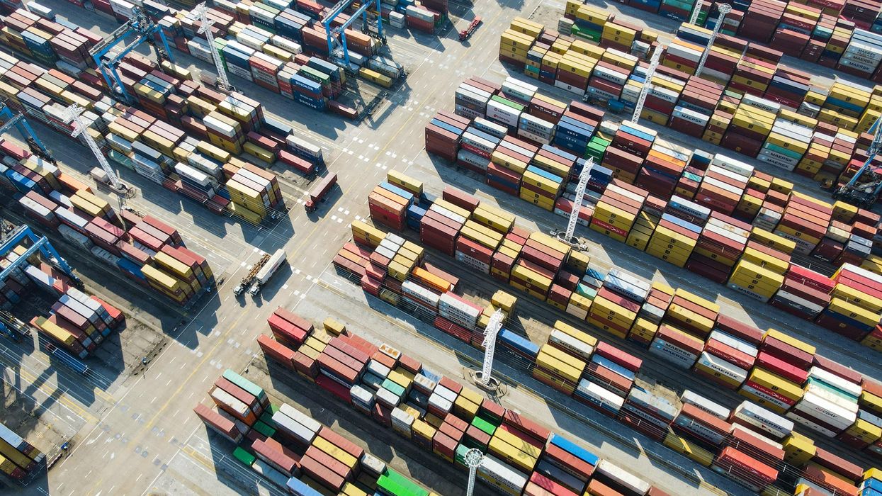 Aerial view of shipping containers sitting stacked at Zhoushan Port on November 11, 2021 in Zhoushan, China
