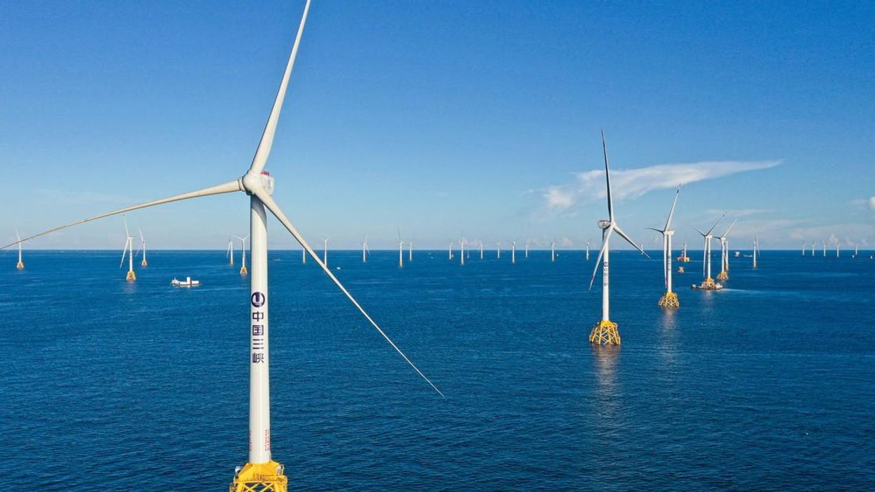Aerial view of the construction site of an offshore wind farm, invested by China Three Gorges Renewables (Group) Co., Ltd, on July 15, 2021 in Yangjiang, Guangdong Province of China