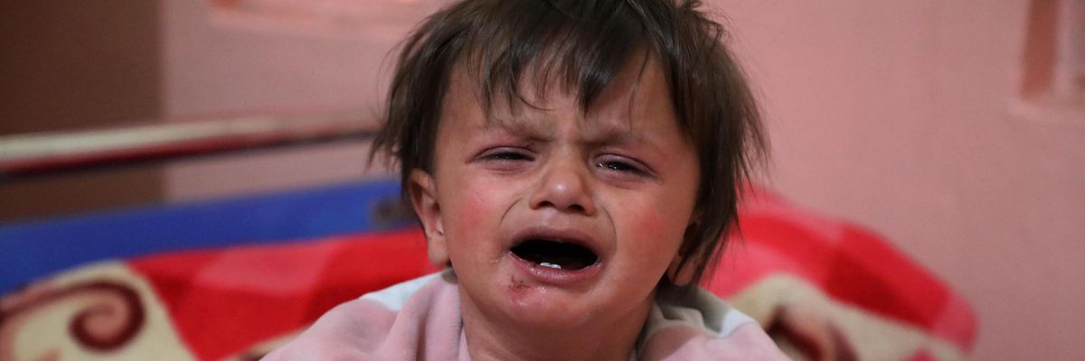 Afghan child cries in hospital
