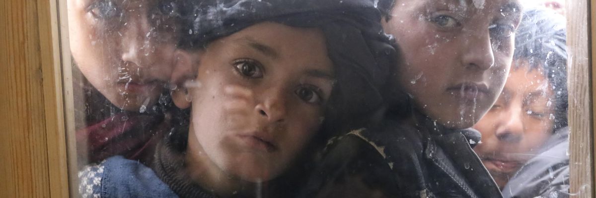 Afghan children gather at school