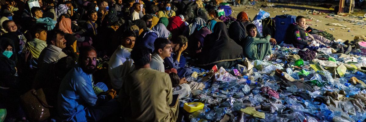 Afghan refugees wait in Kabul