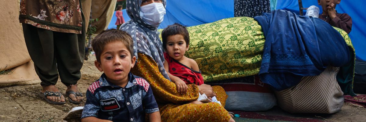 Afghans flee fighting between the Taliban and Afghan security forces