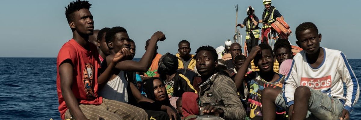 African migrants prepare to be rescued in the Mediterranean Sea