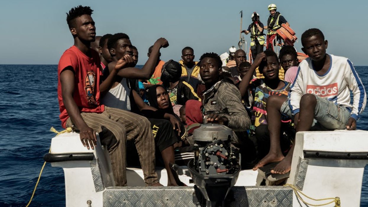 African migrants prepare to be rescued in the Mediterranean Sea