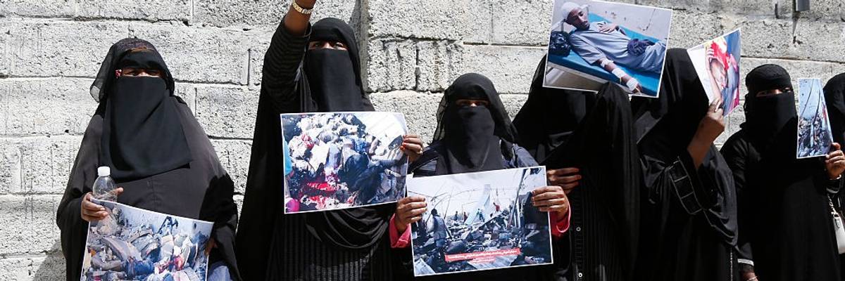 African women protest a U.S. airstrike on a migrant detention center in Yemen