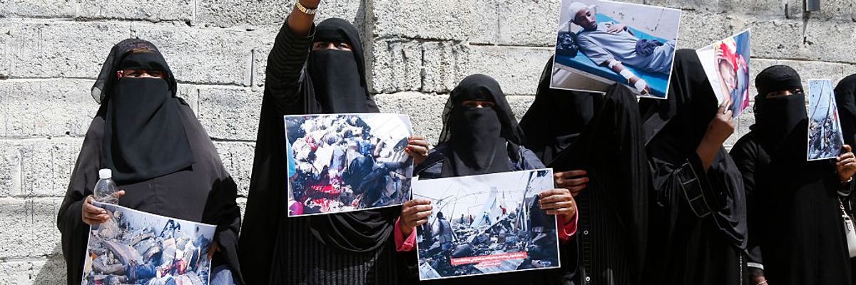 African women protest a U.S. airstrike on a migrant detention center in Yemen