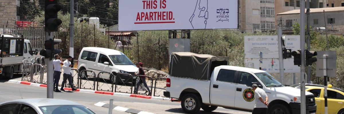 Ahead of U.S. President Joe Biden's visit to the occupied West Bank, Israeli human rights group B'tselem put up billboards saying "this is apartheid" in Bethlehem and Ramallah on July 13, 2022. 