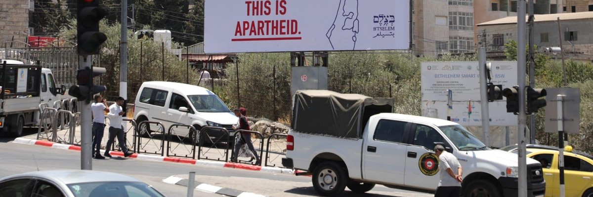Ahead of U.S. President Joe Biden's visit to the occupied West Bank, Israeli human rights group B'tselem put up billboards saying "this is apartheid" in Bethlehem and Ramallah on July 13, 2022.