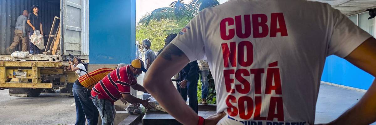 Aid to Cuba is unloaded.
