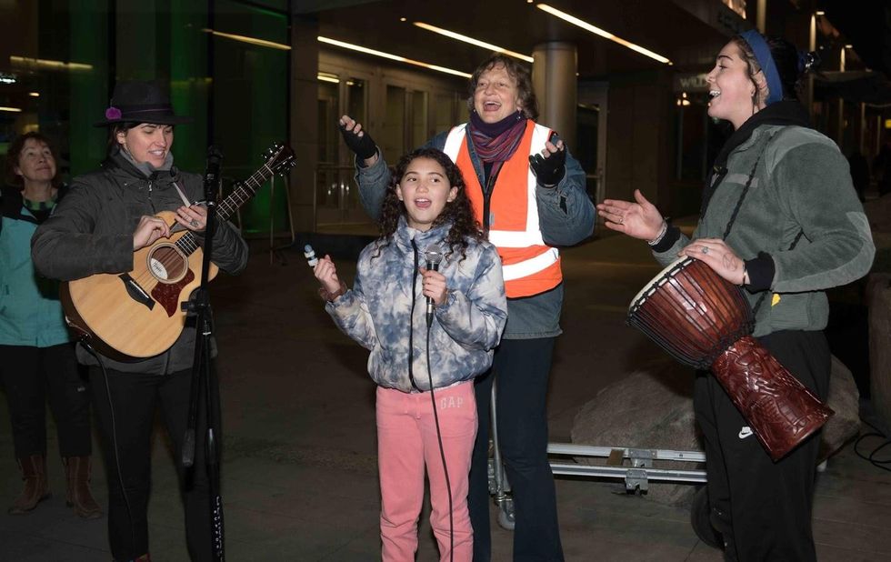 Alexandra Blakely and daughter perform and lead songs. (Photo: Elliot Stoller)