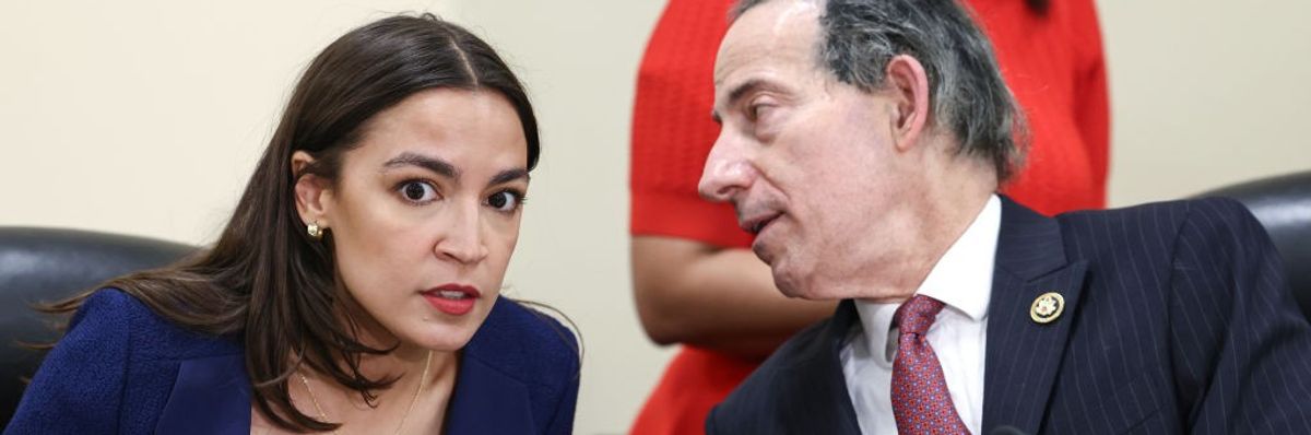 Alexandria Ocasio-Cortez next to Jamie Raskin