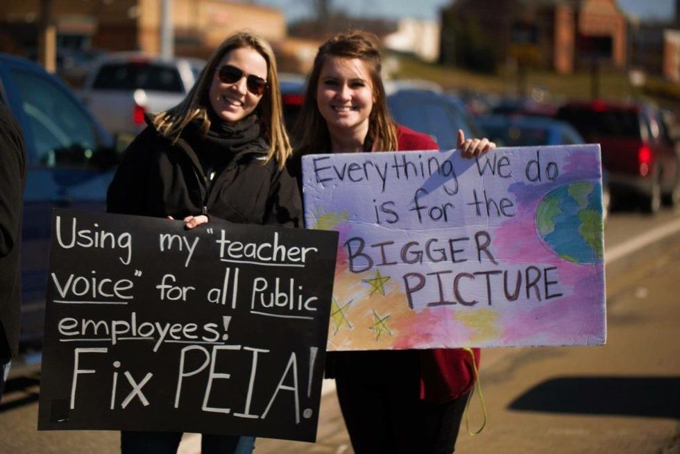 Alexis Allen, kindergarten paraprofessional, and Christianna Shaffer, kindergarten teacher, picket in Morgantown, West Virginia. (Photo: Dan Gifford)