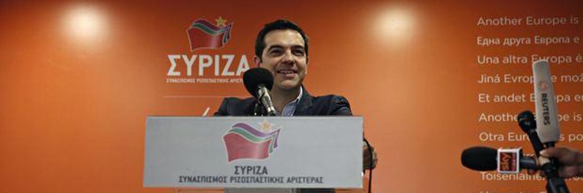 Alexis Tsipras speaks to the press in Athens after the success of the Syriza party in the European elections