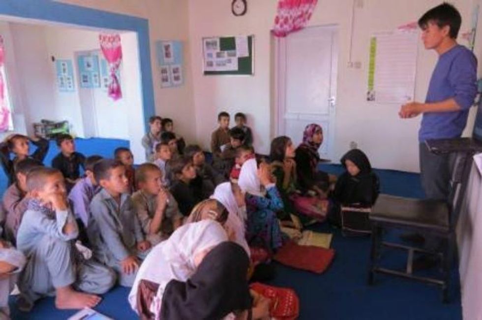 Ali teaching at Street Kids' School. (Photo courtesy of Brian Terrell)