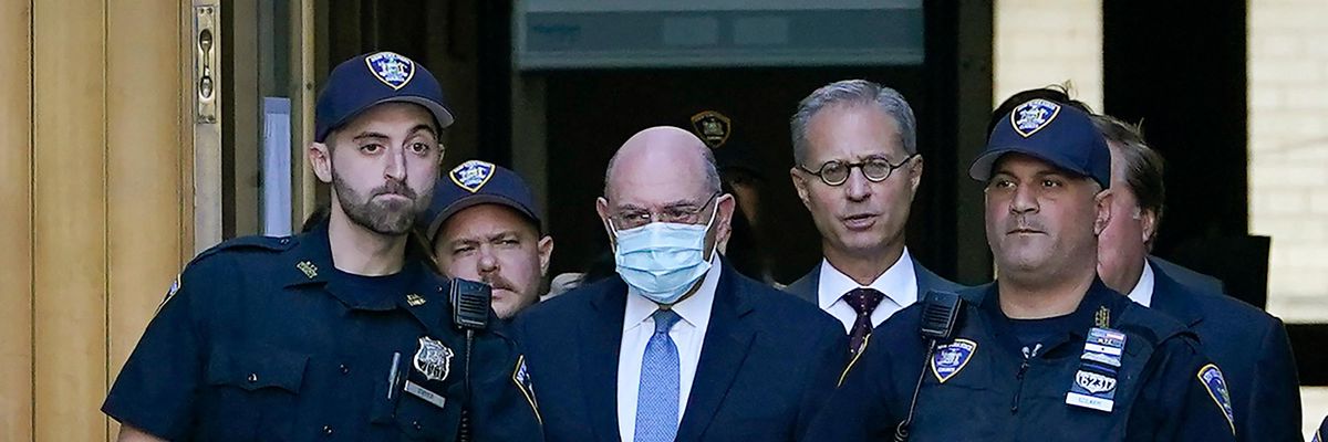 Allen Weisselberg leaves a courthouse