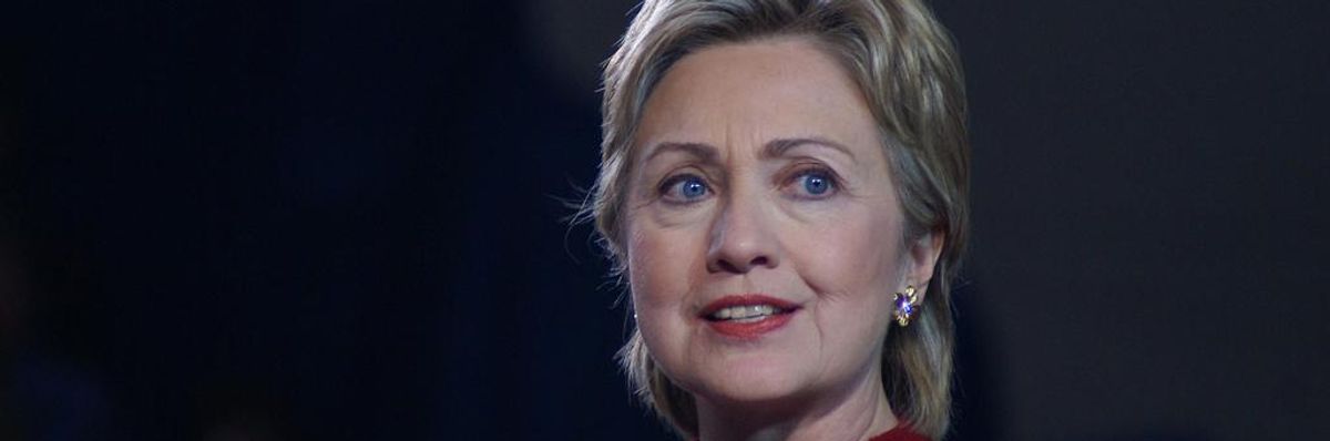 Clinton Challenged to Break Up--and Break Up With--Wall Street Banks