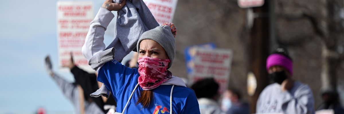 Amanda Solano and other members of United Food and Commercial Workers Local 7 gathered for a rally in Glendale, Colorado, on January 13, 2022, during the strike against King Soopers.