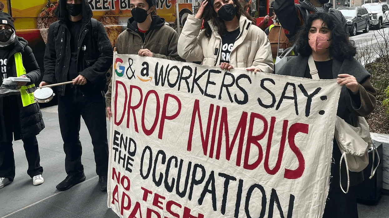 Amazon and Google workers hold a sign saying "Drop Project Nimbus"