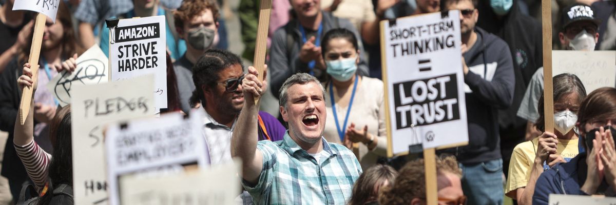 Amazon employees protest mass layoffs.