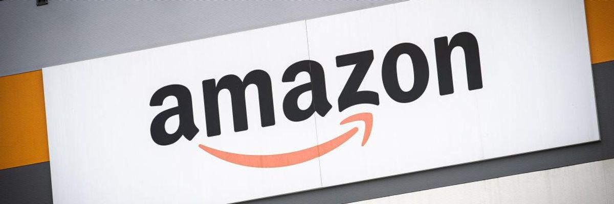 Amazon's logo is seen outside a distribution center. (Photo by Nicolò Campo/LightRocket via Getty Images)