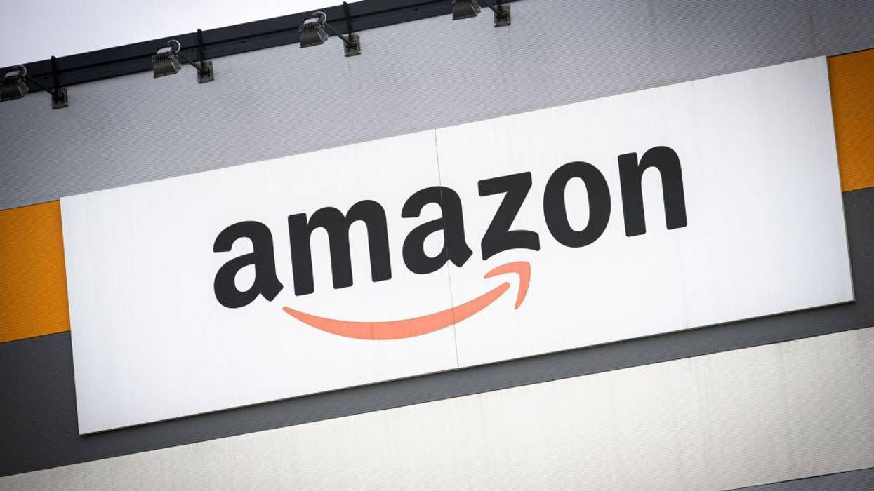 Amazon's logo is seen outside a distribution center. (Photo by Nicolò Campo/LightRocket via Getty Images)