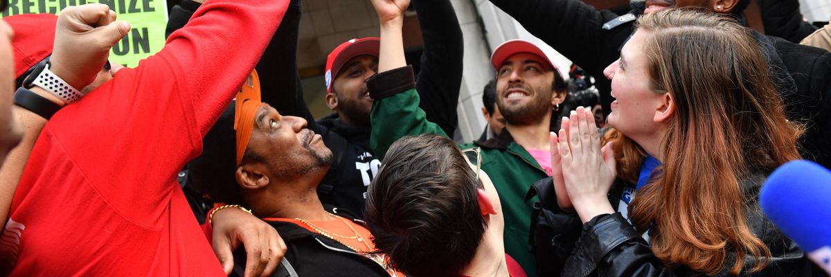 Amazon workers celebrate their union election win